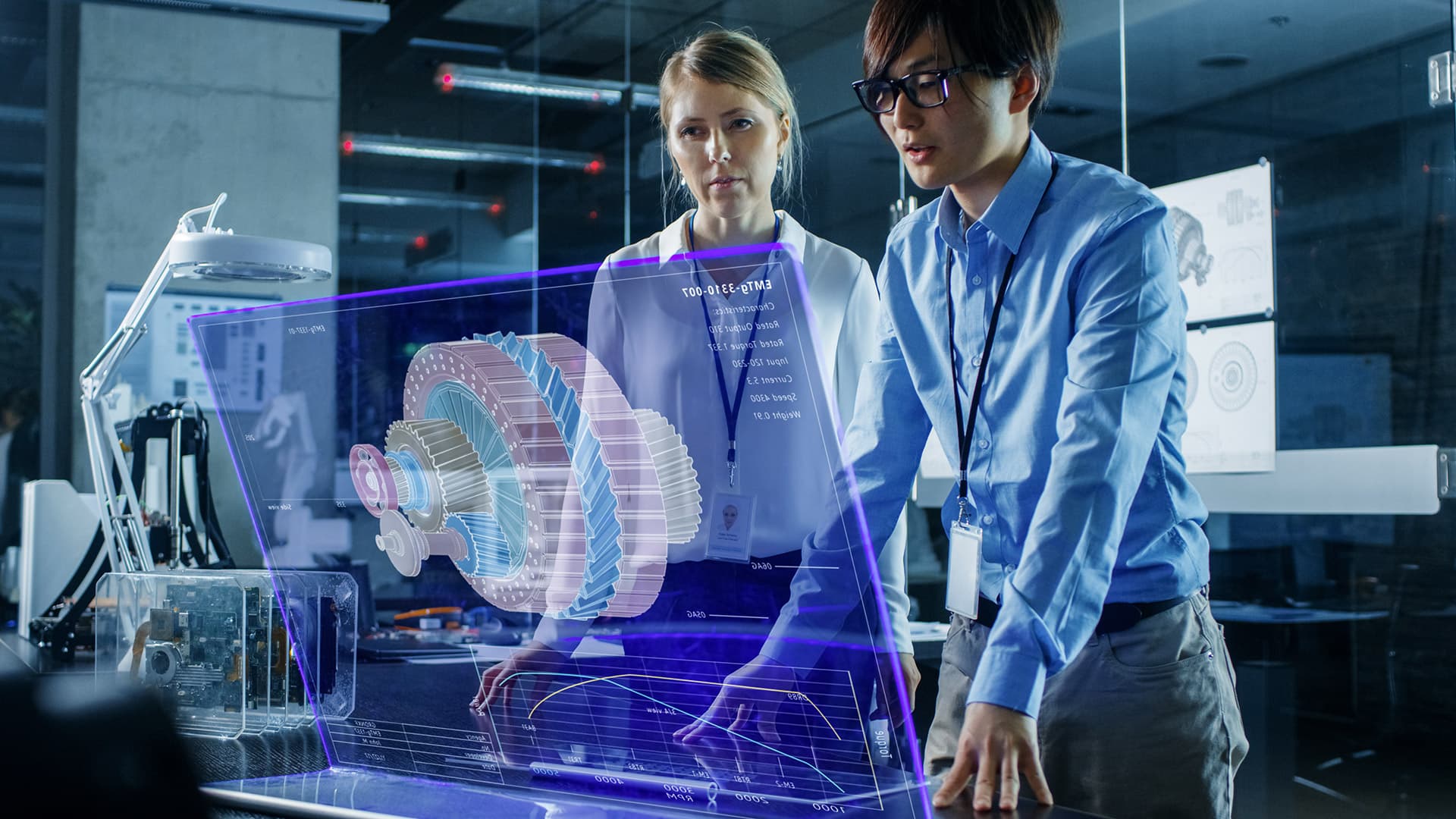 Male and Female Engineers looking at AR for Enterprise at their workplace