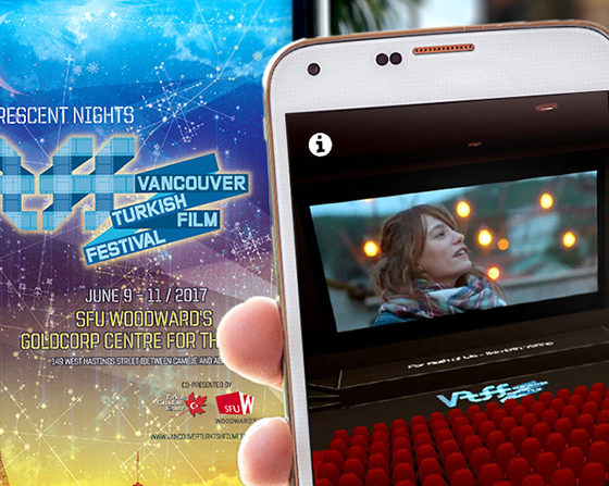 Female hand holding iphone at transit stop poster to view interactive augmented reality app for Vancouver Turkish Film Festival