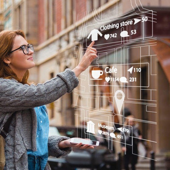 woman navigating on phone using augmented reality selecting clothing store