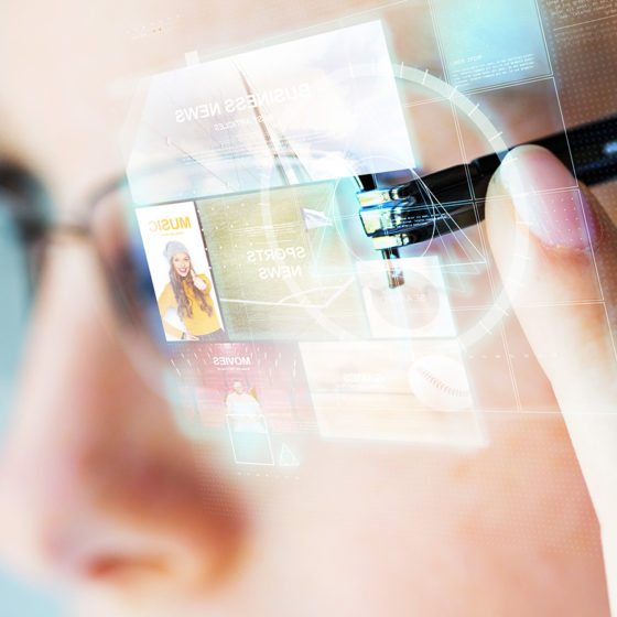 close up of woman in glasses with virtual screen