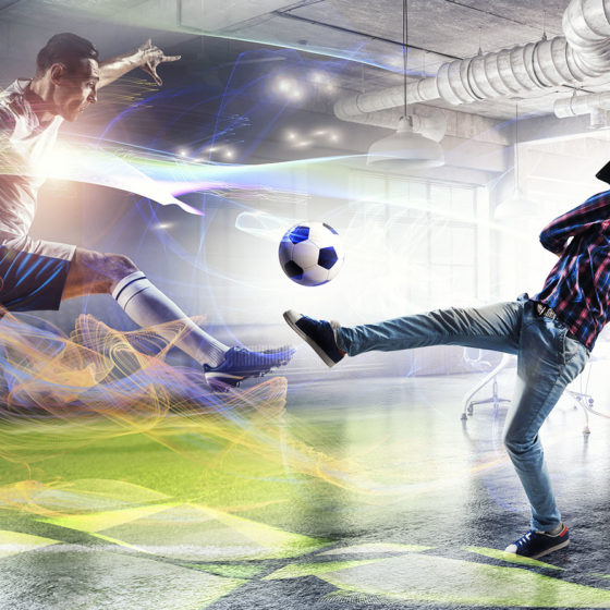 man immersed into VR Video by playing soccer with a player