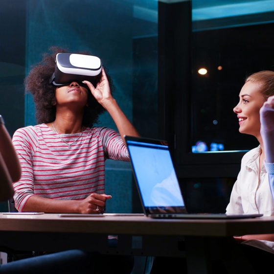 client is trying virtual reality headset in a meeting setup