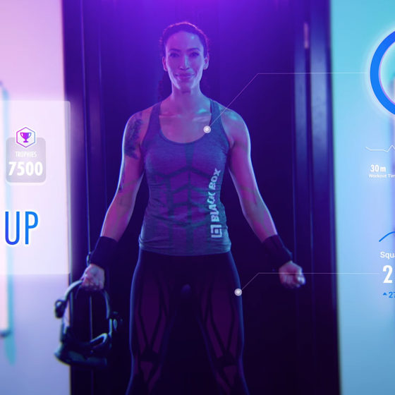 Female Model in Black Box VR Gym Commercial