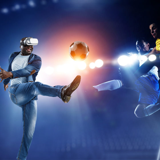 Virtual Reality headset on a male playing soccer for vr esports.