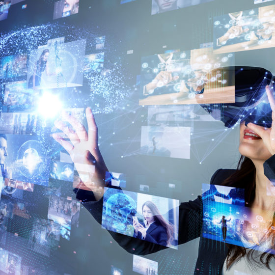 businesswoman wearing a vr headset xploring content for her business